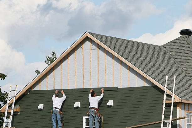 Professional Siding technician working in Taylorsville, NC